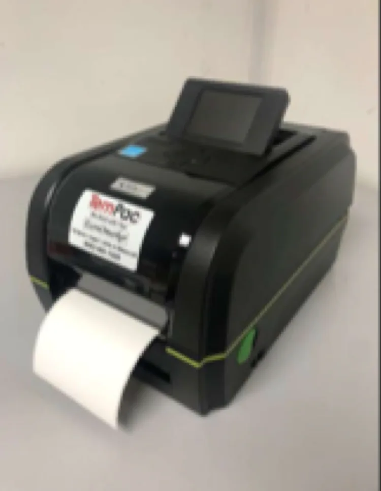 Solo2 T245 compact label printer with a flip-up color display and a blank label feeding from the front