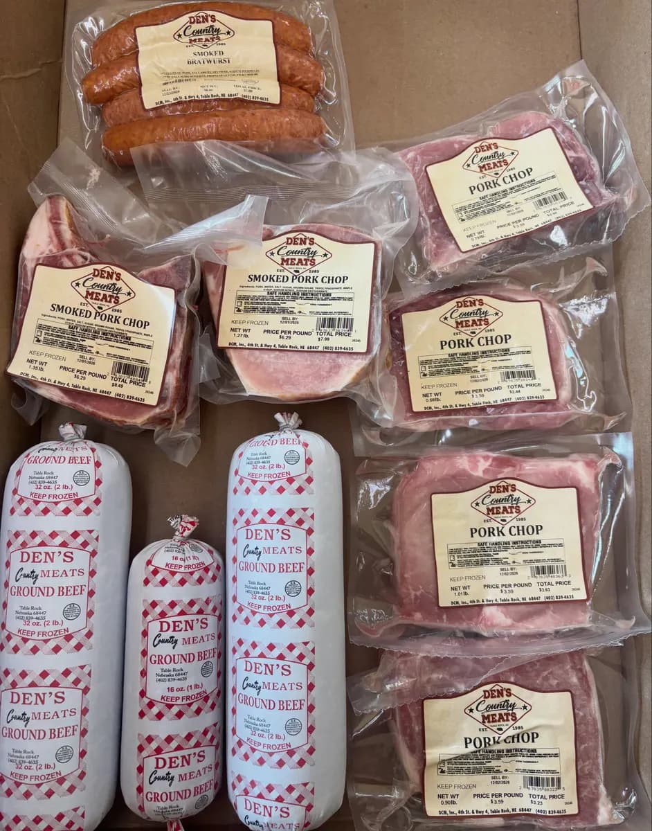 Vacuum-packed pork chops, smoked sausage rings and ground beef chubs, each with a printed brand label